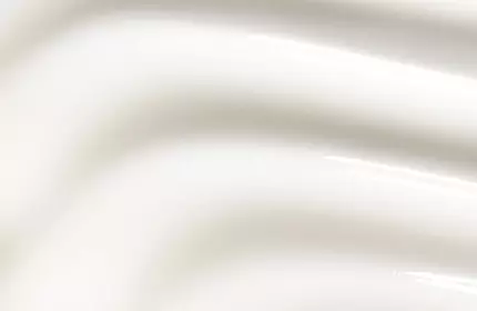 Two skincare products from SkinCeuticals are displayed against a soft, cream-colored background. The left product is a tube labeled "Retinol 0.5," and the right product is a dark glass bottle labeled "Hydrating B5."